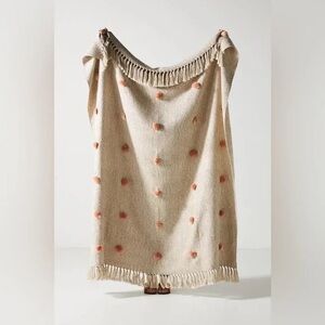 Anthropologie polka dot Pom throw